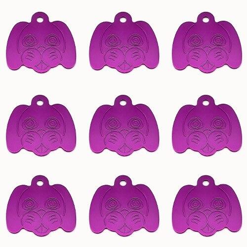 Wholesale pack of 100 personalized dog head pattern pet ID tags in various colors, showcasing their reflective and durable aluminum design.